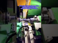 CNC cylindrical grinding machine with automatic loading and unloading of drill chucks